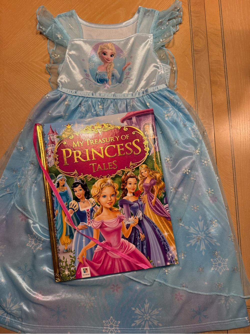 Disney Light Blue Elsa Princess night gown with a treasury of princess book .